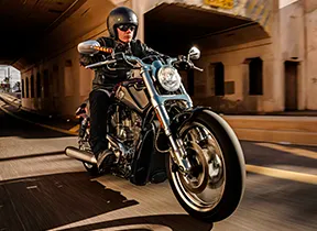 person riding motorcycle with sunglasses